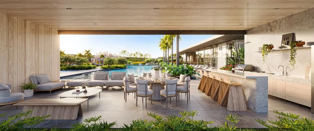 Pool House do Harmonia Natureza com sala de estar, mesa de jantar e bancada de bar de frente para a piscina